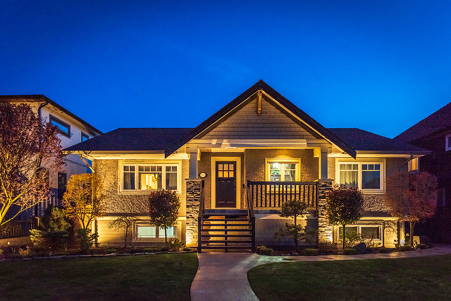 Luxury house at night with fantastic outdoor accent lights.