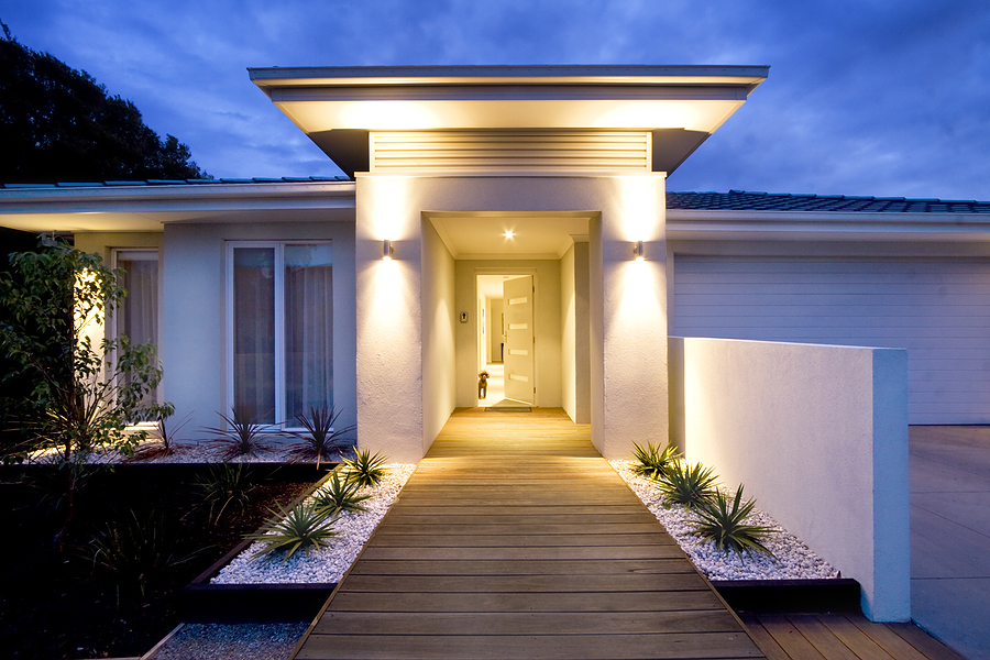 Grand entrance to a contemporary home. Outdoor lighting design.