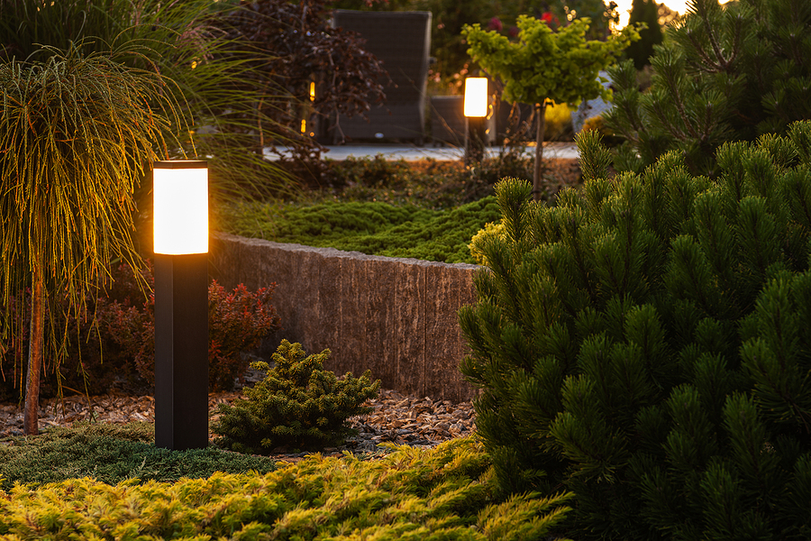 Landscape light posts in a tiered yard